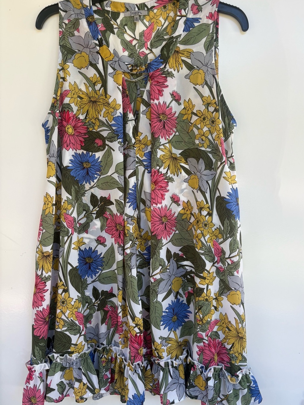 JODIFL White Floral Sleeveless Tie-Neck Ruffle Hem Camisole